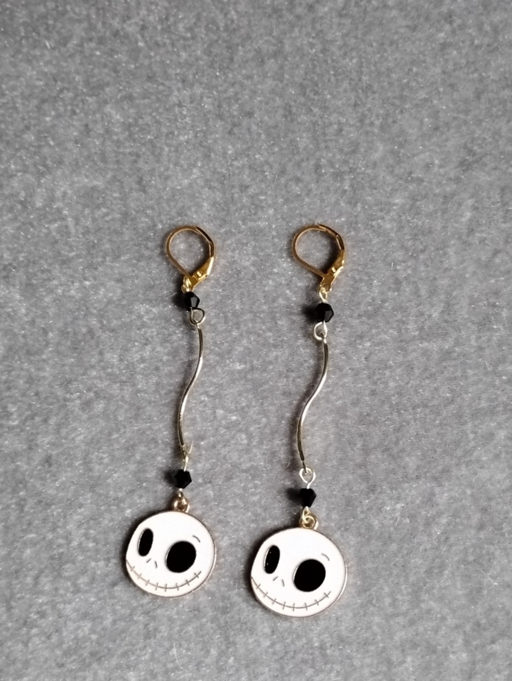 Hand Crafted Gold Tone Ghost Face Duster Earrings With Black Spinel Accents